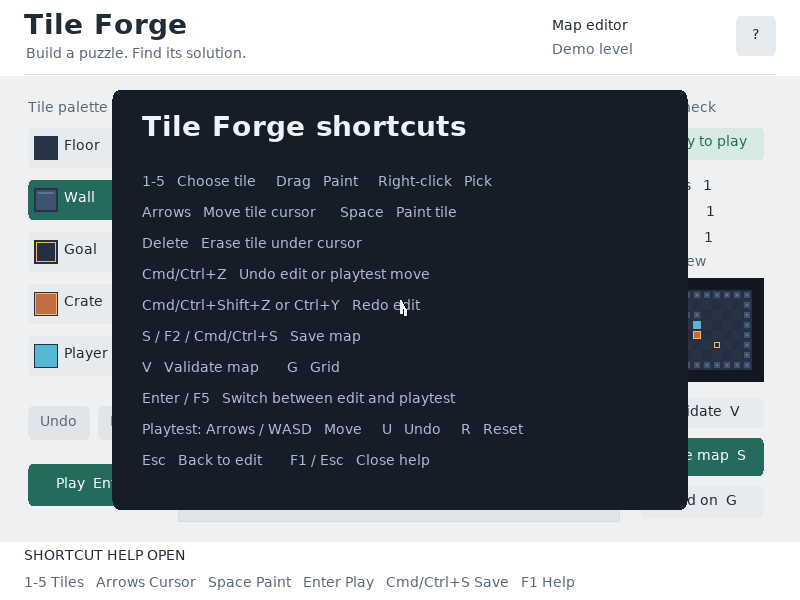 The in-app control map covers keyboard editing, playtesting, validation and saving.